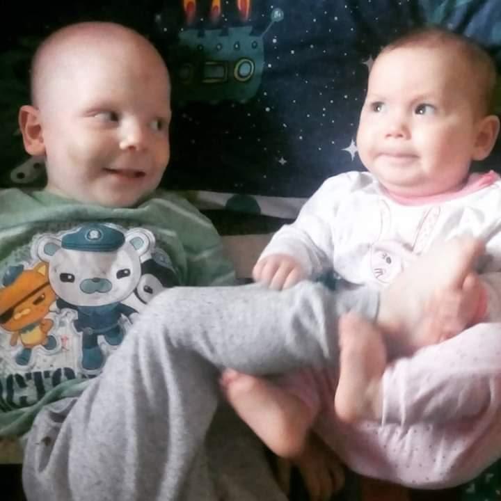 Danye with one of his siblings