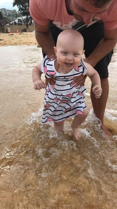 Indianna in the water at the beach