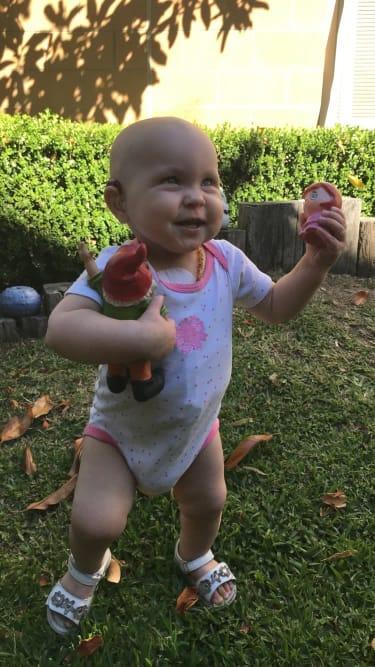 Indianna playing the backyard