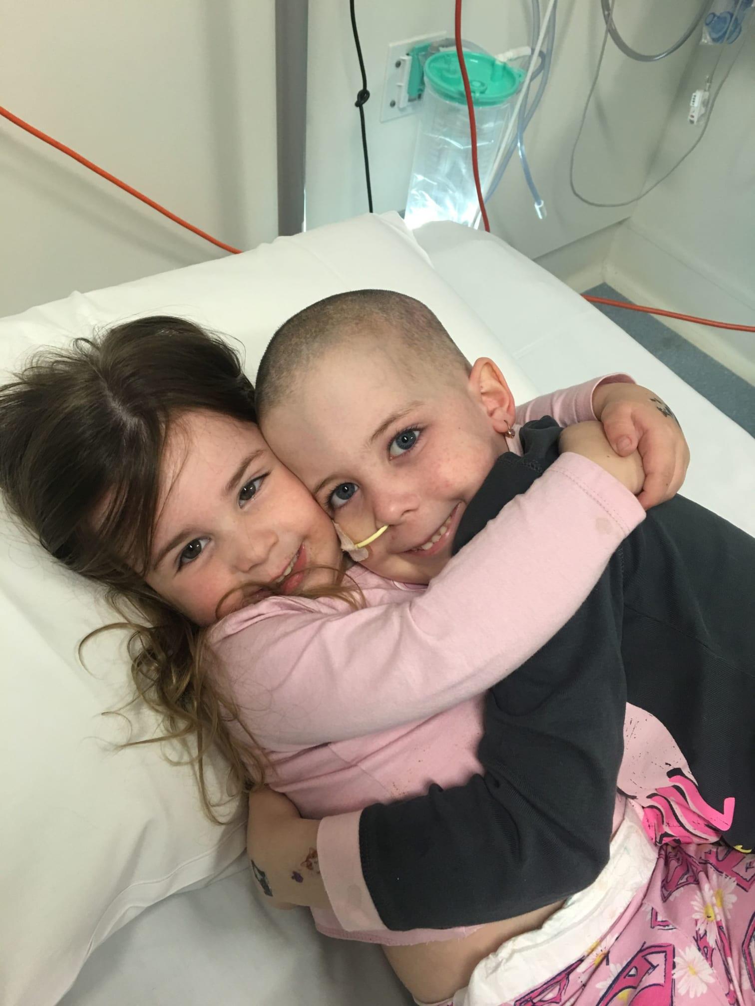 Amber with her sister in hospital