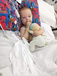 Nixon lying in a hospital bed
